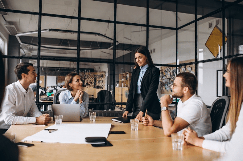 Office Employees Discussing